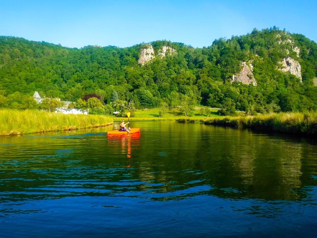 A woman kayaking in the sun