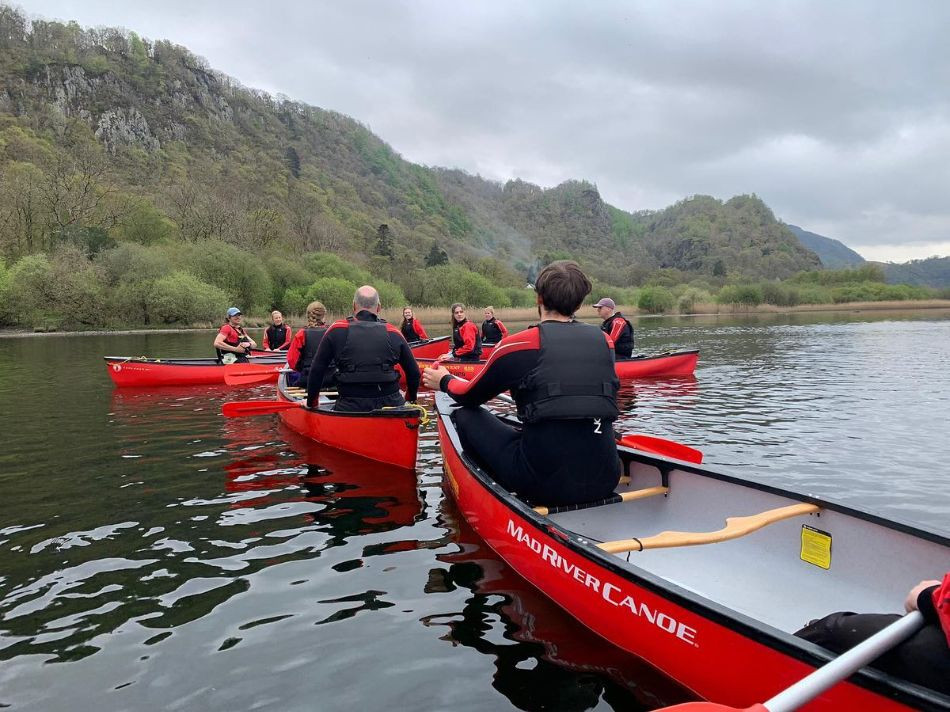 Group canoeing on Derwentwater