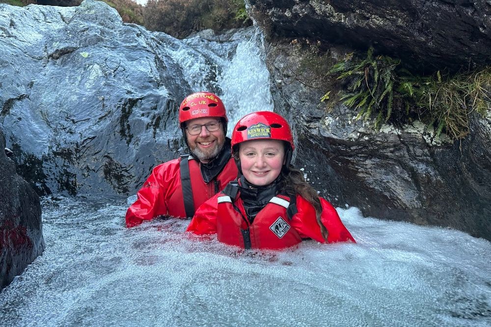 Dad and daughter in a ghyll pool